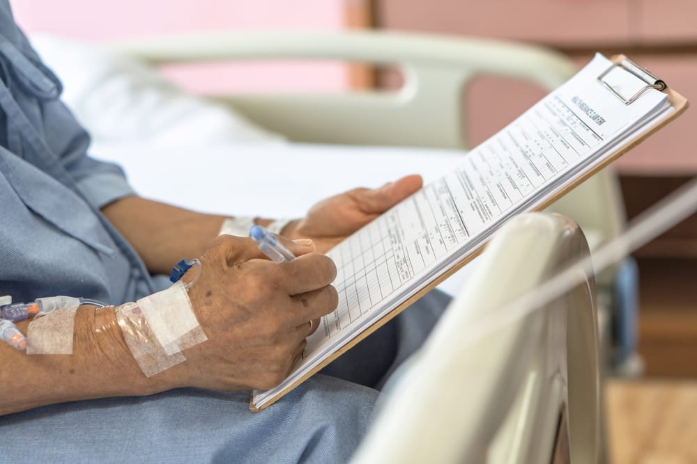 Health insurance claim form application for medicare coverage and medical treatment for patient with illness
